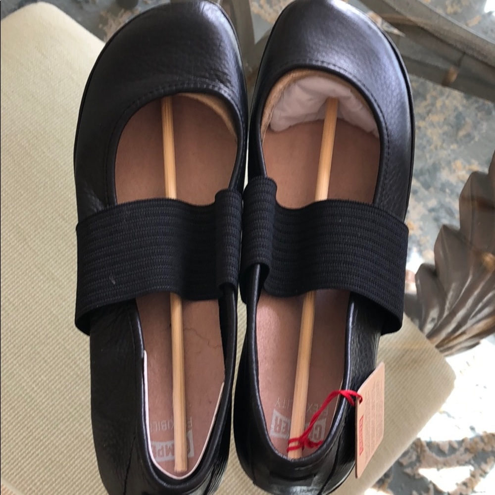 Black leather ballet slippers